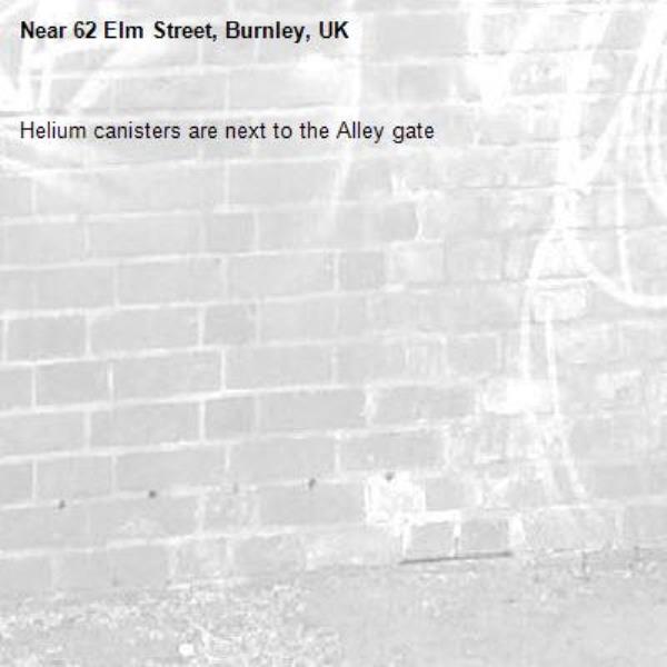 Helium canisters are next to the Alley gate-62 Elm Street, Burnley, UK