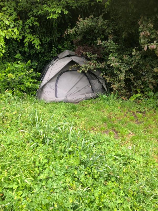 Brookmilll Park. Please clear an illegal camp from front grass area-Public Convenience, Brookmill Road, London, SE8 4JF