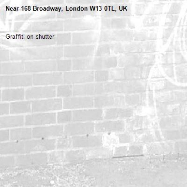 Graffiti on shutter-168 Broadway, London W13 0TL, UK