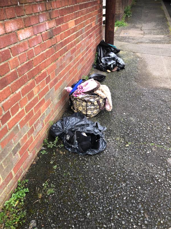 Please clear flytip of clothes-24 Lambscroft Avenue, Grove Park, London, SE9 4NZ