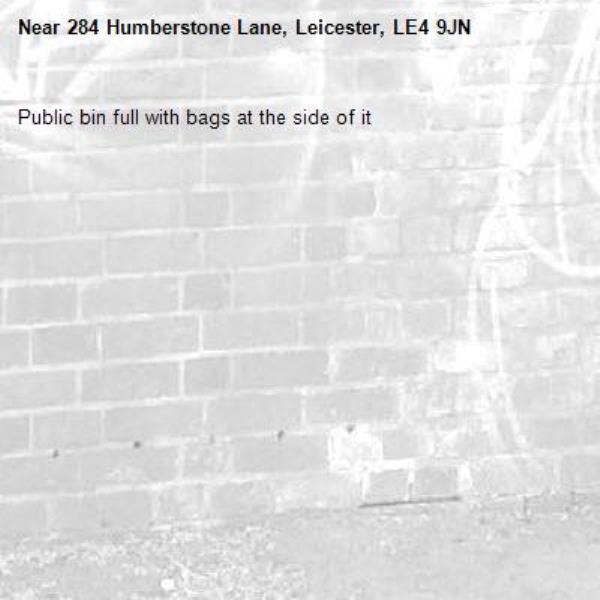 Public bin full with bags at the side of it-284 Humberstone Lane, Leicester, LE4 9JN