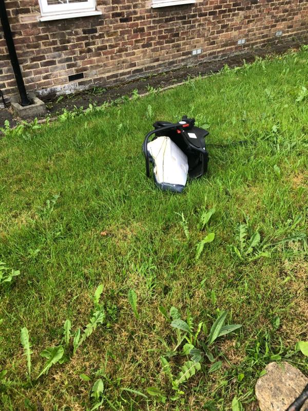 248-254 . Please clear dumped baby carrier from communal front garden-244 Waters Road, London, SE6 1UJ