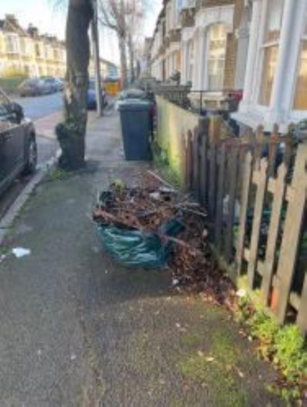 Bag of garden waste that has been there since before Christmas. -90 Hunsdon Road, New Cross Gate, SE14 5RF