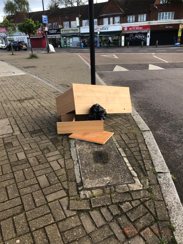 Junction of Bamford Road. Please clear flytip of wood-424 Bromley Road, London, BR1 4PL