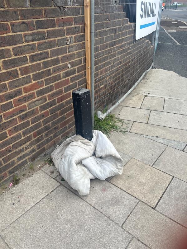 Entrance to manor road - someone has left a dirty duvet 

No standards -Barking Road, Canning Town, London