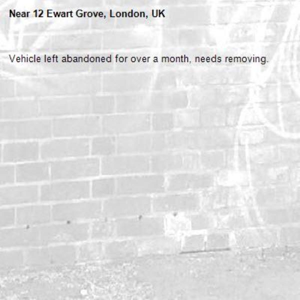 Vehicle left abandoned for over a month, needs removing.-12 Ewart Grove, London, UK