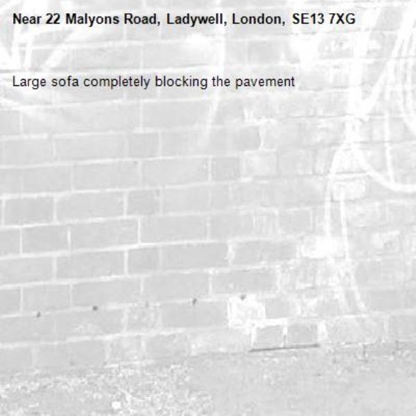 Large sofa completely blocking the pavement -22 Malyons Road, Ladywell, London, SE13 7XG