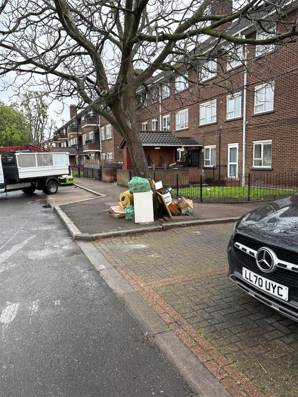 several household items furniture needs to be collected located around a tree-25 Bridgeland Road, Canning Town, London, E16 3AD