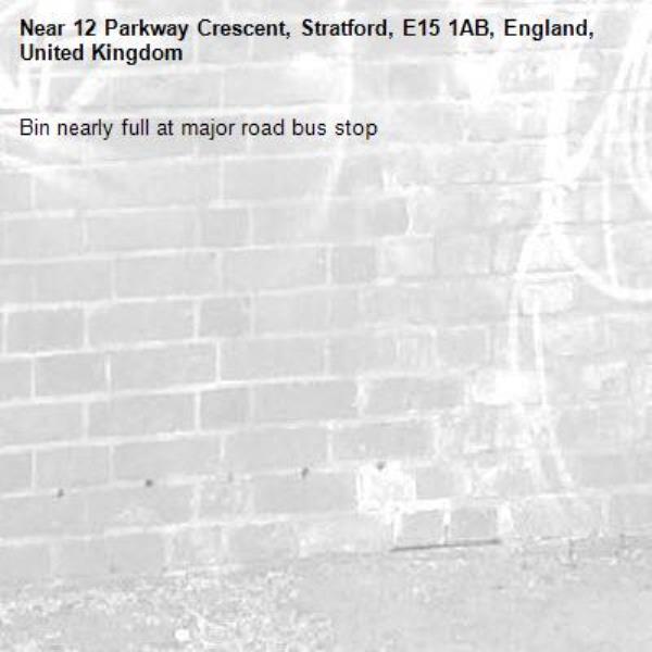 Bin nearly full at major road bus stop -12 Parkway Crescent, Stratford, E15 1AB, England, United Kingdom