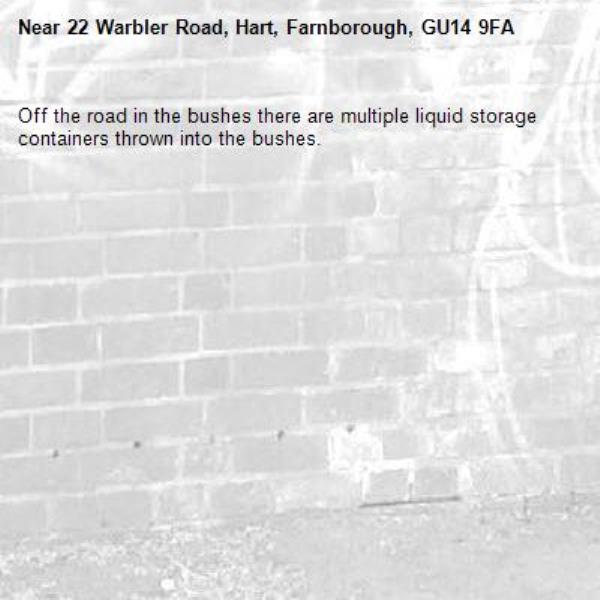 Off the road in the bushes there are multiple liquid storage containers thrown into the bushes.-22 Warbler Road, Hart, Farnborough, GU14 9FA
