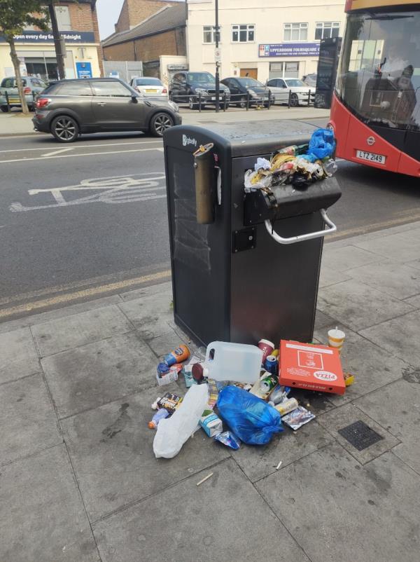 Big belly bin overflowing -548A, Barking Road, Plaistow, London, E13 9JU