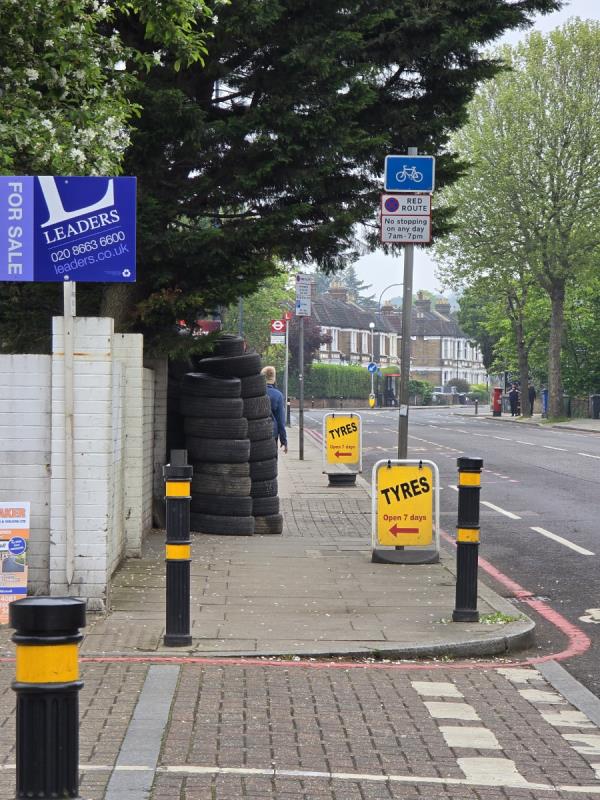 Tyre shop once again blocking the pavement with dangerous piles of tyres. -Flat 1, 240 Stanstead Road, Catford, London, SE23 1DD