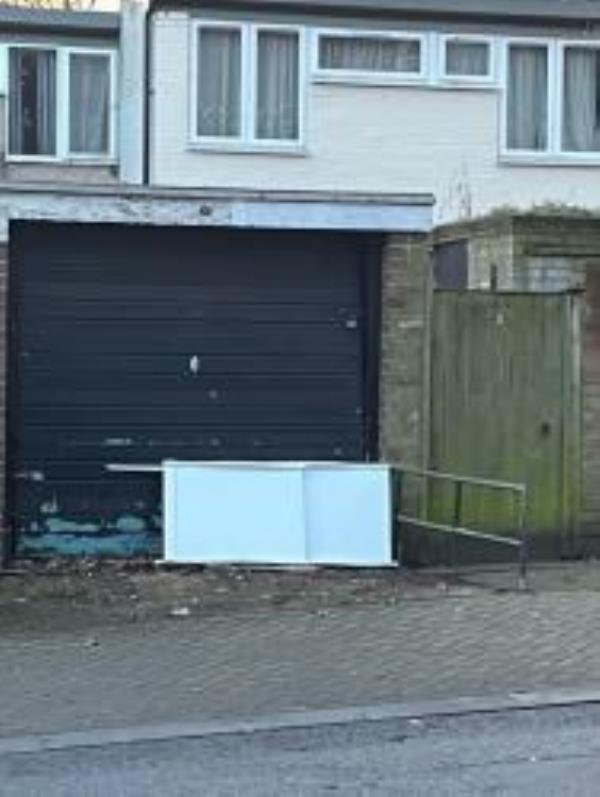 By no 33 Mayow Road.. please clear a dumped door from outside garage. -35 Mayow Road, London, SE23 2XE