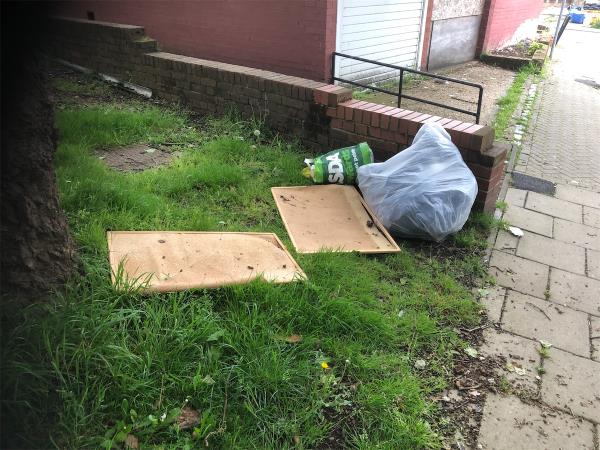 On the Front grass area in front of no 4,Shifford path. Please clear flytip bags-10 Shifford Path, London, SE23 2XE