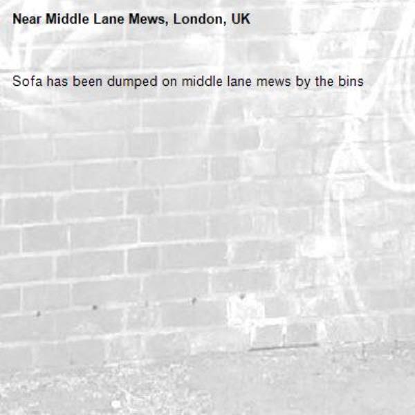 Sofa has been dumped on middle lane mews by the bins-Middle Lane Mews, London, UK