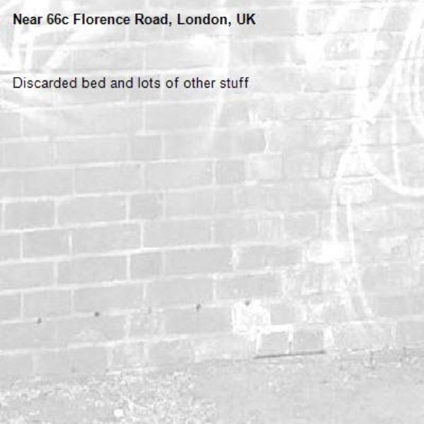 Discarded bed and lots of other stuff -66c Florence Road, London, UK
