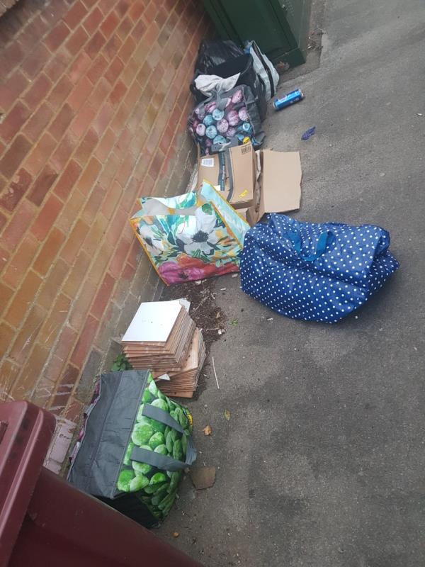 Bags of rubbish and tiles-110 Belmont Road, Reading, RG30 2UX