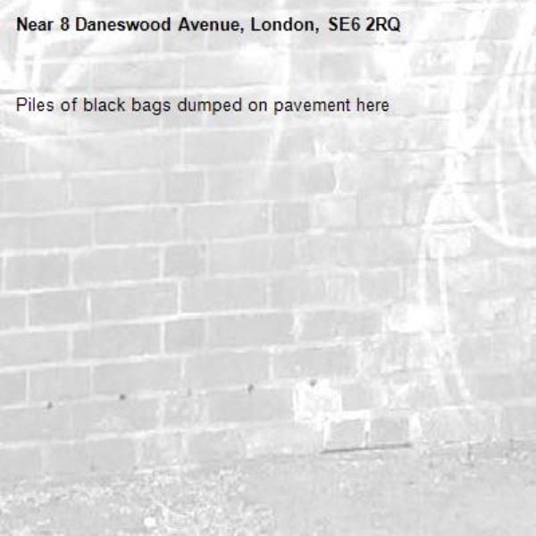 Piles of black bags dumped on pavement here -8 Daneswood Avenue, London, SE6 2RQ