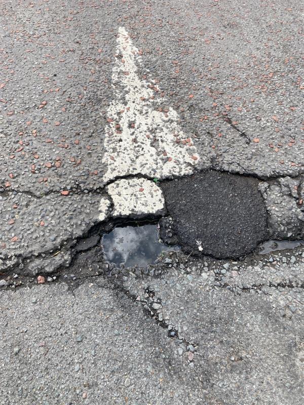 The road at this location has been eroded by heavy rainfall. As a result it has created a series of potholes at this location and at various points along the length of High Level Drive. Please could you arrange to inspect and repair/resurface. Thank you. -22 High Level Drive, London, SE26 6XT