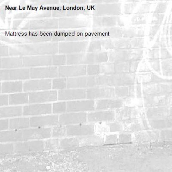 Mattress has been dumped on pavement -Le May Avenue, London, UK