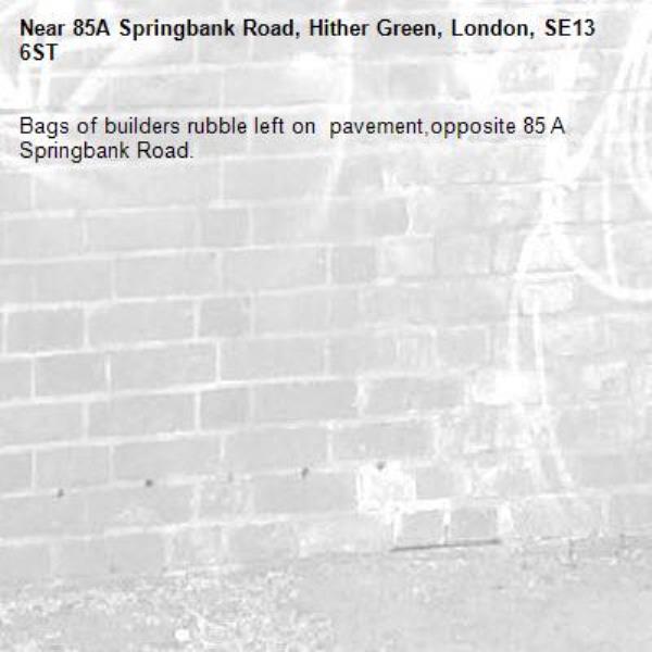 Bags of builders rubble left on  pavement,opposite 85 A Springbank Road.-85A Springbank Road, Hither Green, London, SE13 6ST