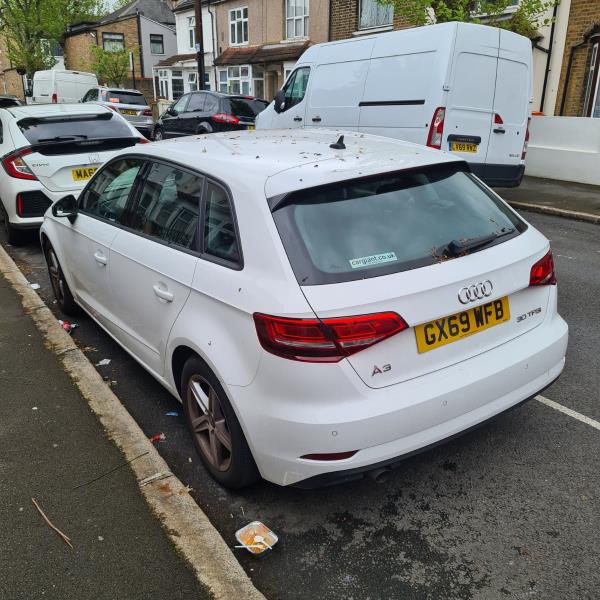 The people in this car just left their food packets on the ground. -35 Marlborough Road, Forest Gate, London, E7 8HA