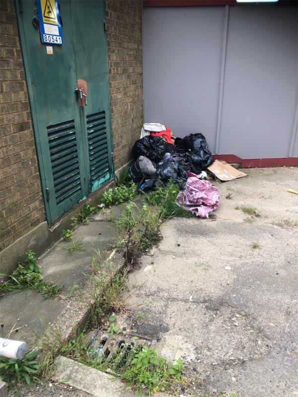 Please clear flytip of bags from by sub station-Millcroft House, Melfield Gardens, London, SE6 3AJ