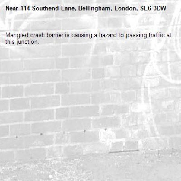 Mangled crash barrier is causing a hazard to passing traffic at this junction. -114 Southend Lane, Bellingham, London, SE6 3DW
