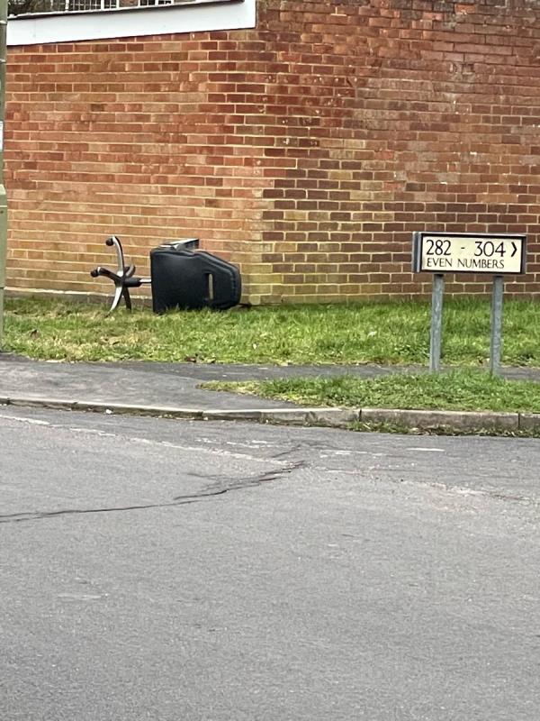 Fly tipping on Pinewood Park, by the 282-304 “Even Numbers” road sign-In the centre of Pinewood Park, Fernhill Ward