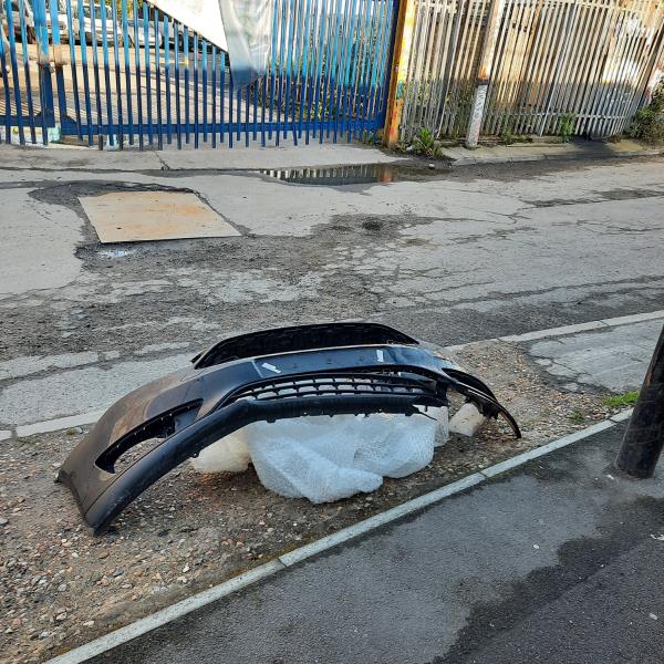Car bumper and bubble wrap dumped outside HATS Transport services Thank you -Senegal Road, Lewisham, London