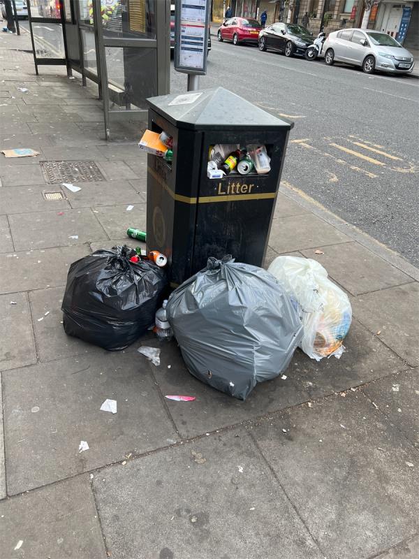 Rubbish strewn across pavement-Asona Ba Supermarket, Basement And Ground Floor, 305 Romford Road, Forest Gate, London, E7 9HA