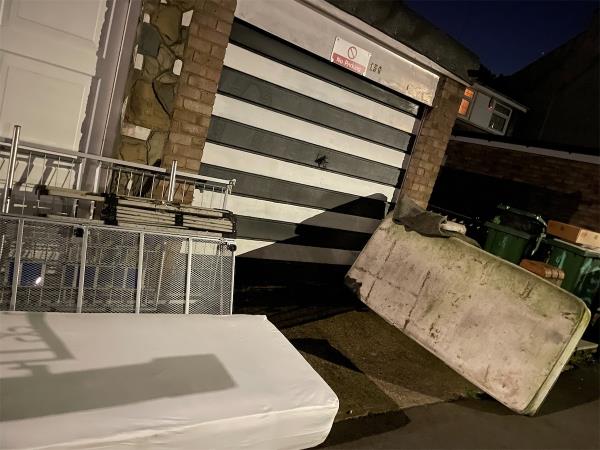 Metal blocking pavement and two mattresses near school-136 Lathom Road, East Ham, London, E6 2DY