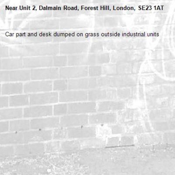 Car part and desk dumped on grass outside industrial units-Unit 2, Dalmain Road, Forest Hill, London, SE23 1AT
