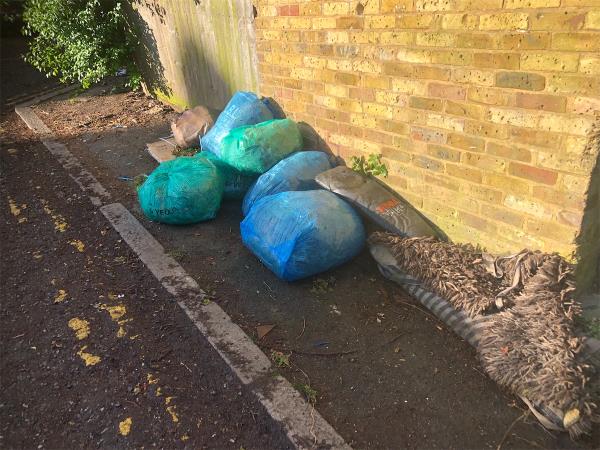 Please clear flytip of bags (2)-24 Merlin Gardens, Bromley, BR1 5JH