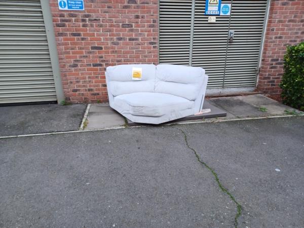 Sofa fly tipped at 18 Robertson Road, E16. -18 Robertson Road, Canning Town, London, E16 1FT