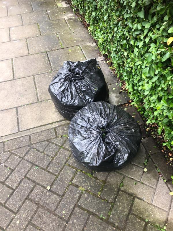 Please clear bags of garden waste-185 Baring Road, London, SE12 0LD