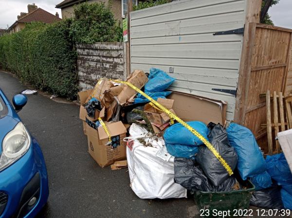Mixed waste, including a big white bag. In Capstone Road BR1-437a Downham Way, Bromley, BR1 5HS