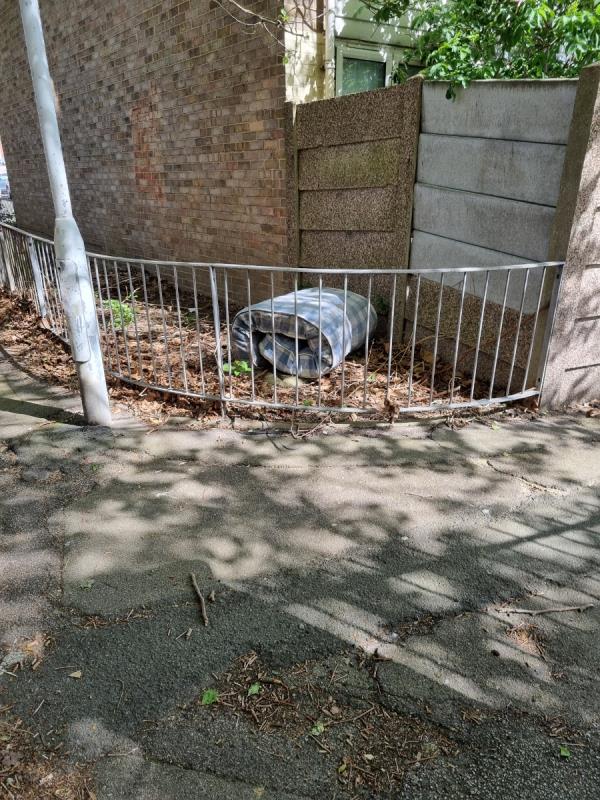 Dumped mattress in pathway behind flats.-20 Ethel Road, Canning Town, London, E16 3AU