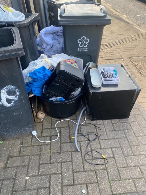 Kitchen items of various sizes have been dumped outside our door, causing an environmental and health hazard.-Shop, 14 Upperton Road, Leicester, LE3 0BG