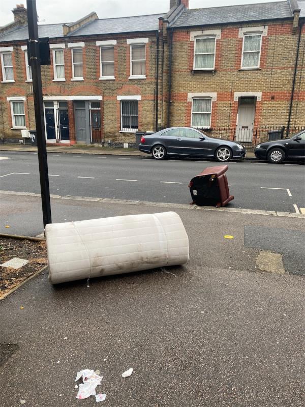 Mattress and chair dumped on pavement by entrance to Chestnuts Park-Flat 1, Oliver Court, 113 Cornwall Road, Tottenham, London, N15 5AX