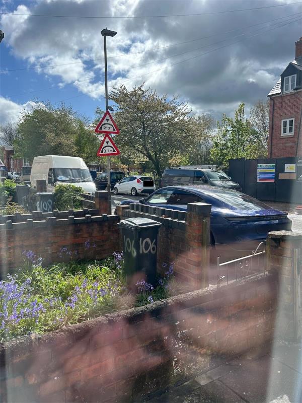 Vehicles from building site opposite parking on double yellow lines and on pavement resting pedestrian footway and road width alike for over an hour to present time-104 Knighton Fields Road West, Leicester, LE2 6LG