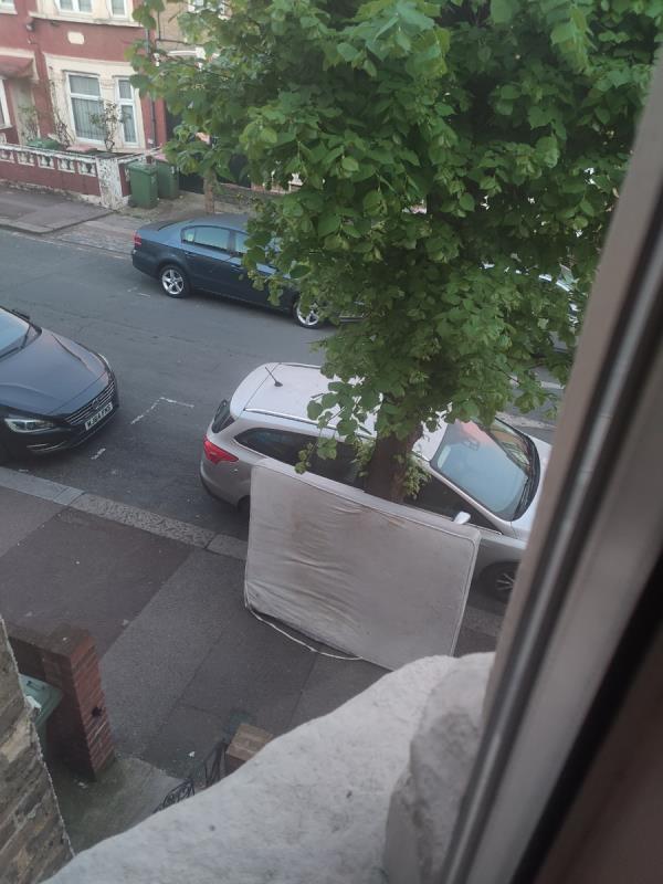 In front of 29 Fourth Avenue by the tree big mattress has been thrown out by somebody.-21 Fourth Avenue, Manor Park, London, E12 6DB
