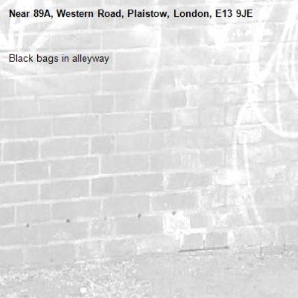 Black bags in alleyway-89A, Western Road, Plaistow, London, E13 9JE