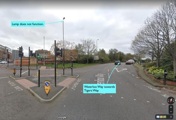 The lamp on the east side of Waterloo Way, right at its junction of London Road, does not function. The lamp overhangs a pedestrian crossing. Please see attached picture.-Arnhem House, 31 Waterloo Way, Leicester LE1 6LP, UK