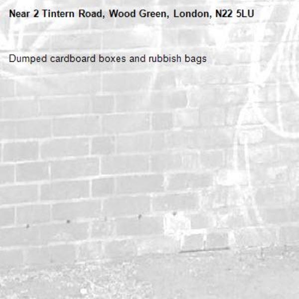 Dumped cardboard boxes and rubbish bags -2 Tintern Road, Wood Green, London, N22 5LU