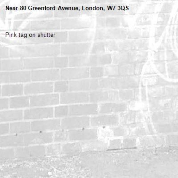 Pink tag on shutter -80 Greenford Avenue, London, W7 3QS