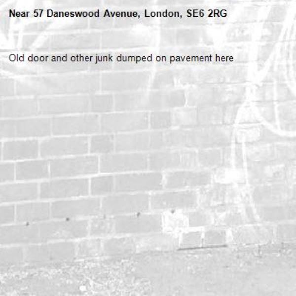 Old door and other junk dumped on pavement here -57 Daneswood Avenue, London, SE6 2RG