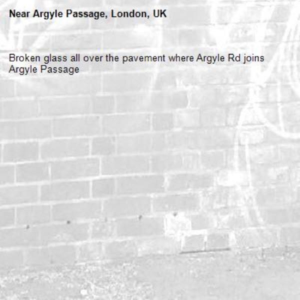 Broken glass all over the pavement where Argyle Rd joins Argyle Passage-Argyle Passage, London, UK