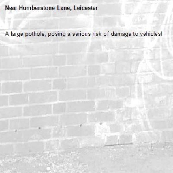 A large pothole, posing a serious risk of damage to vehicles!-Humberstone Lane, Leicester