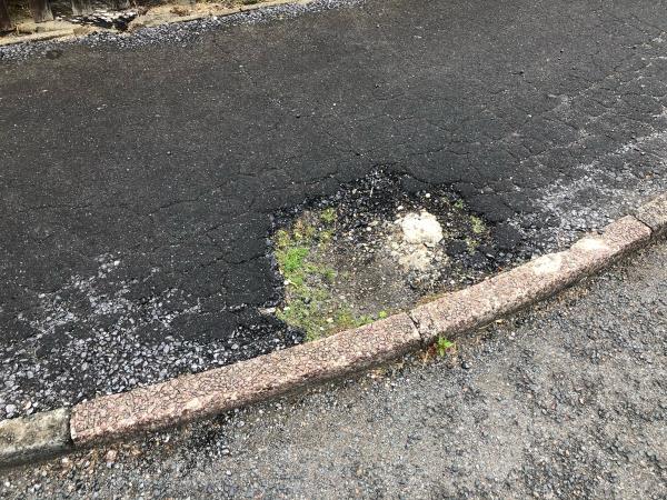 Please repair pot hole to Meliot Road side of property-26 Persant Road, London, SE6 1RX
